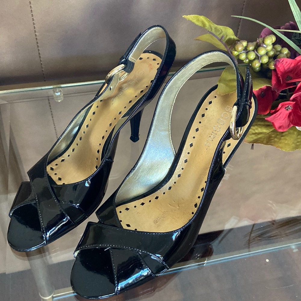 BCBGirls black patent leather open toe, sling back heels!